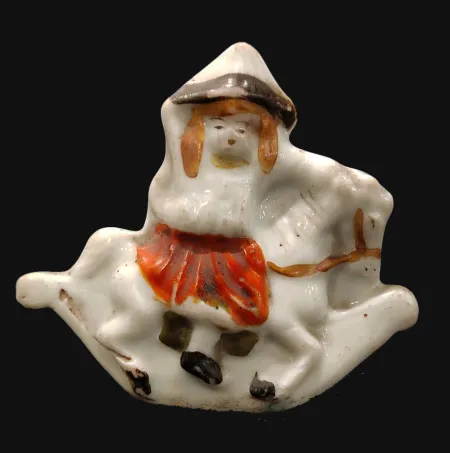 Porcelain Figurine Girl With Rocking Horse